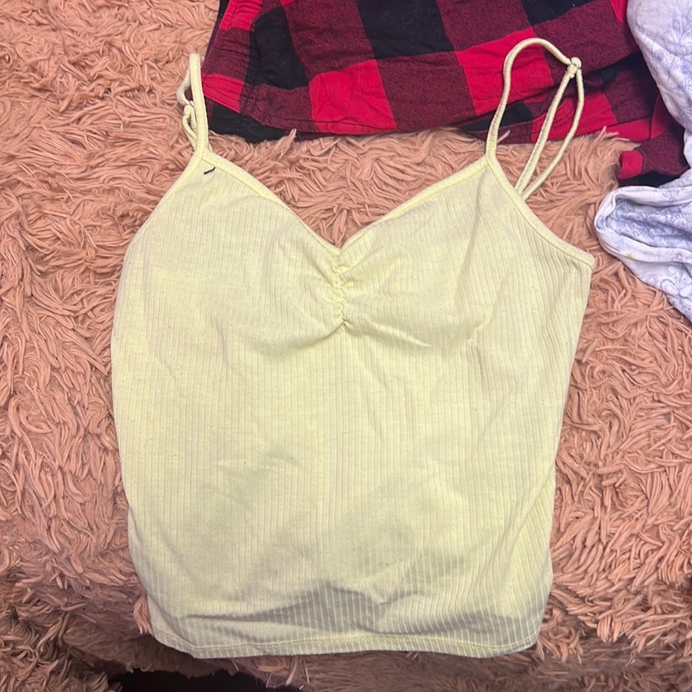 yellow tank top